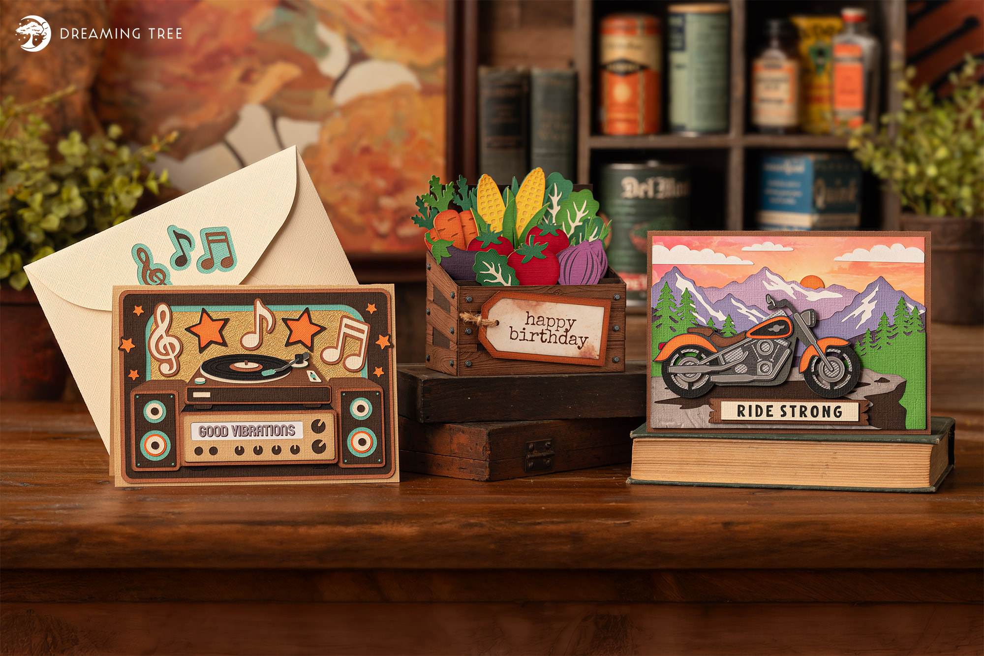 Three layered paper cards with motorcycle, farm and retro stereo designs